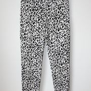 H&M hlače bijele boje/crni print, vel. 34/XS