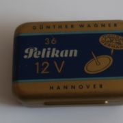 PELIKAN 12 V Vintage tin box 1970s Made in Germany sa rajsnedlama