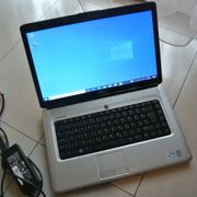 Laptop Dell crveni Inspiron 1545,orginal punjac,baterija drzi preko 1 sat